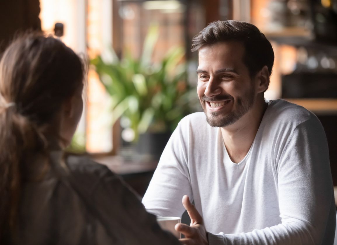 Business owner smiling during a meeting with his accountant