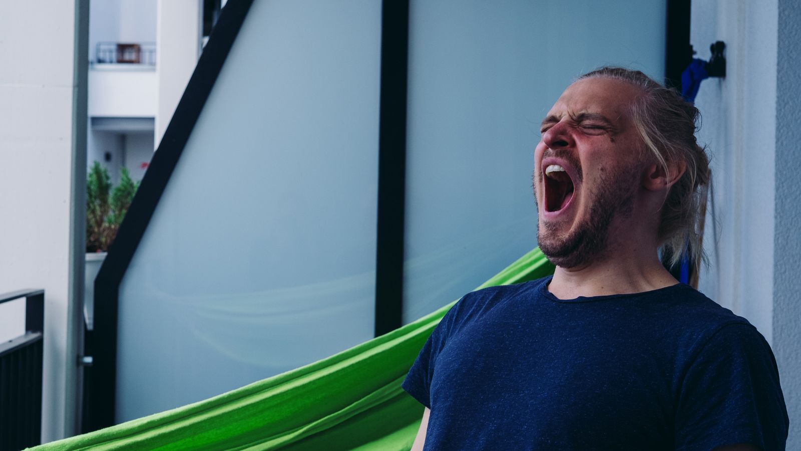 Image of man yawning