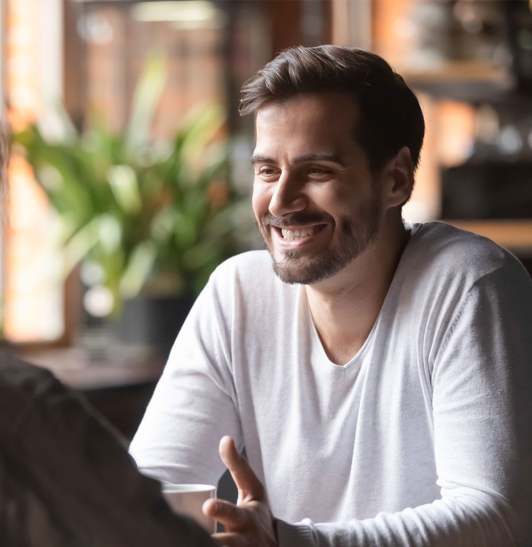 Business owner smiling during a meeting